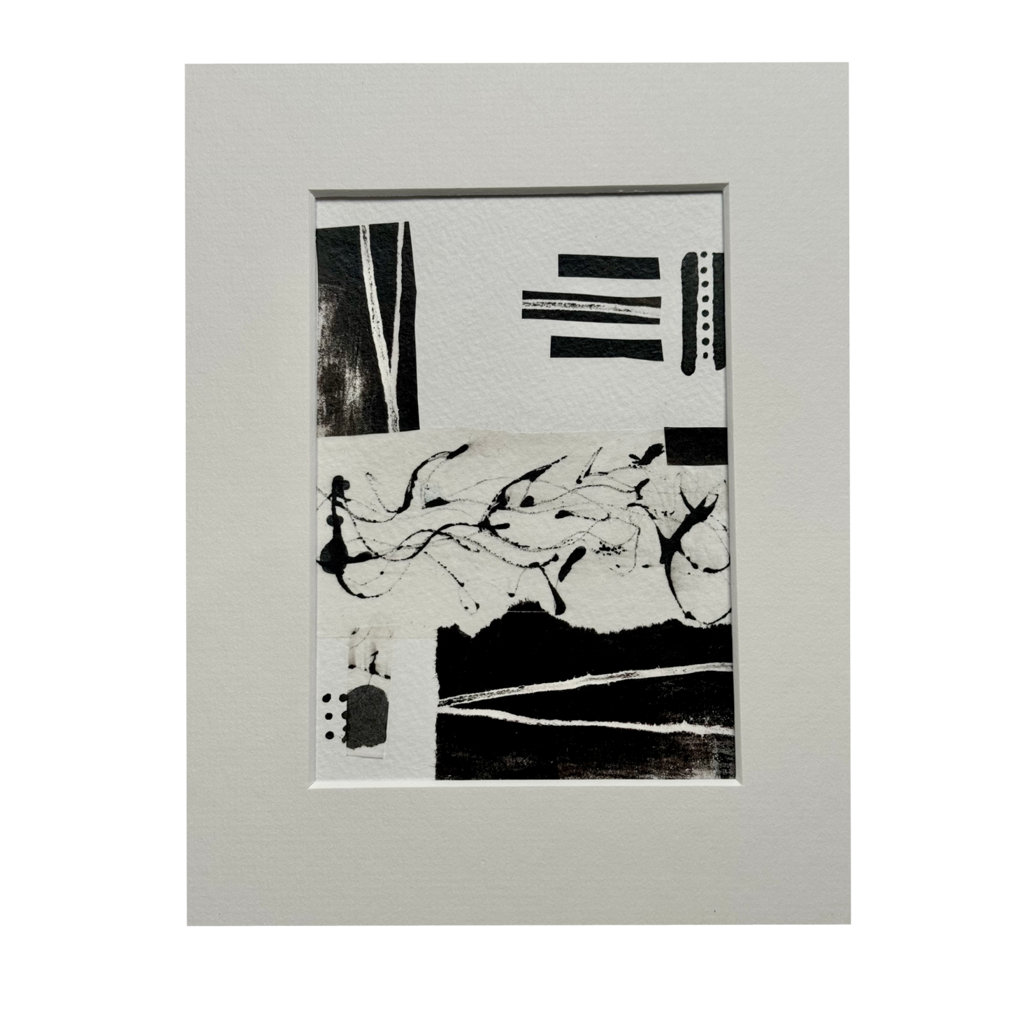 Image of a matted black & white abstract collage.