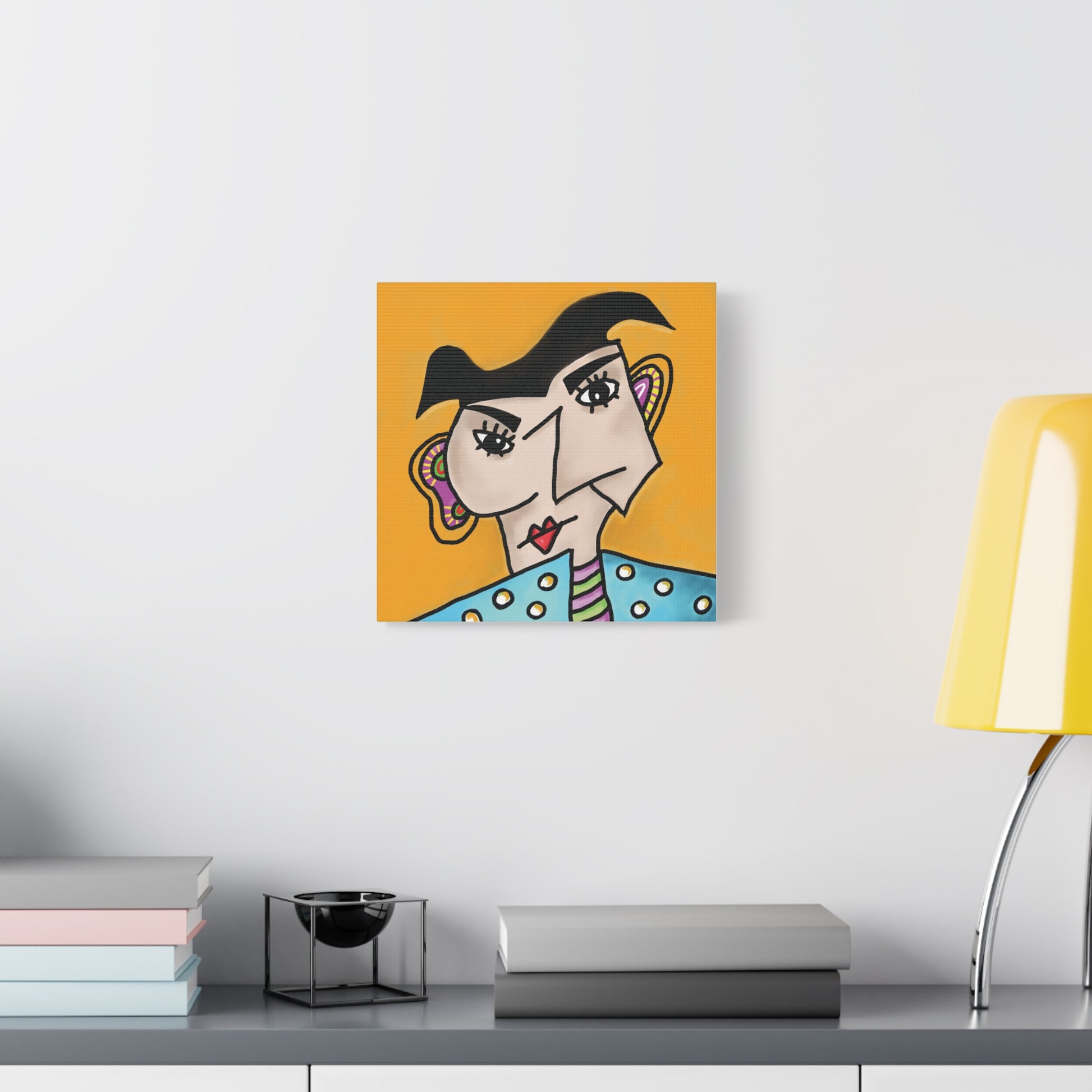 Abstract artwork of a face on an orange background in a modern interior setting.