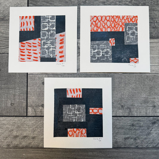 Image of three abstract artworks with black and orange tones.