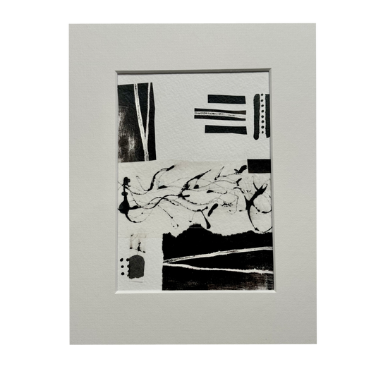 Image of a matted black & white abstract collage.