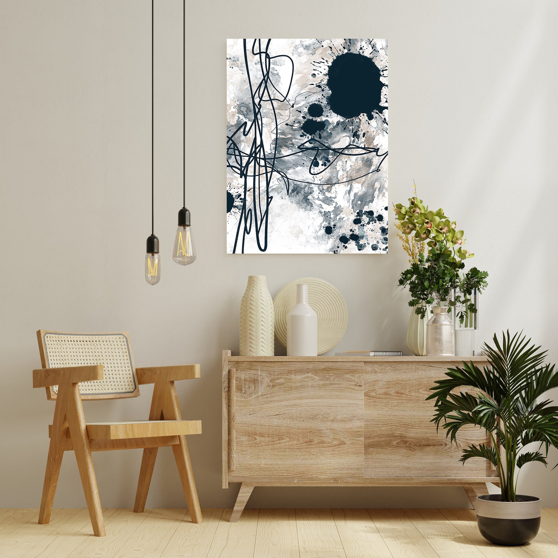 Image of a Scandinavian style room accessorised with wooden furniture, plants , vases and  the abstract artwork 'Ink Dance' by artist Julia Hargreaves.